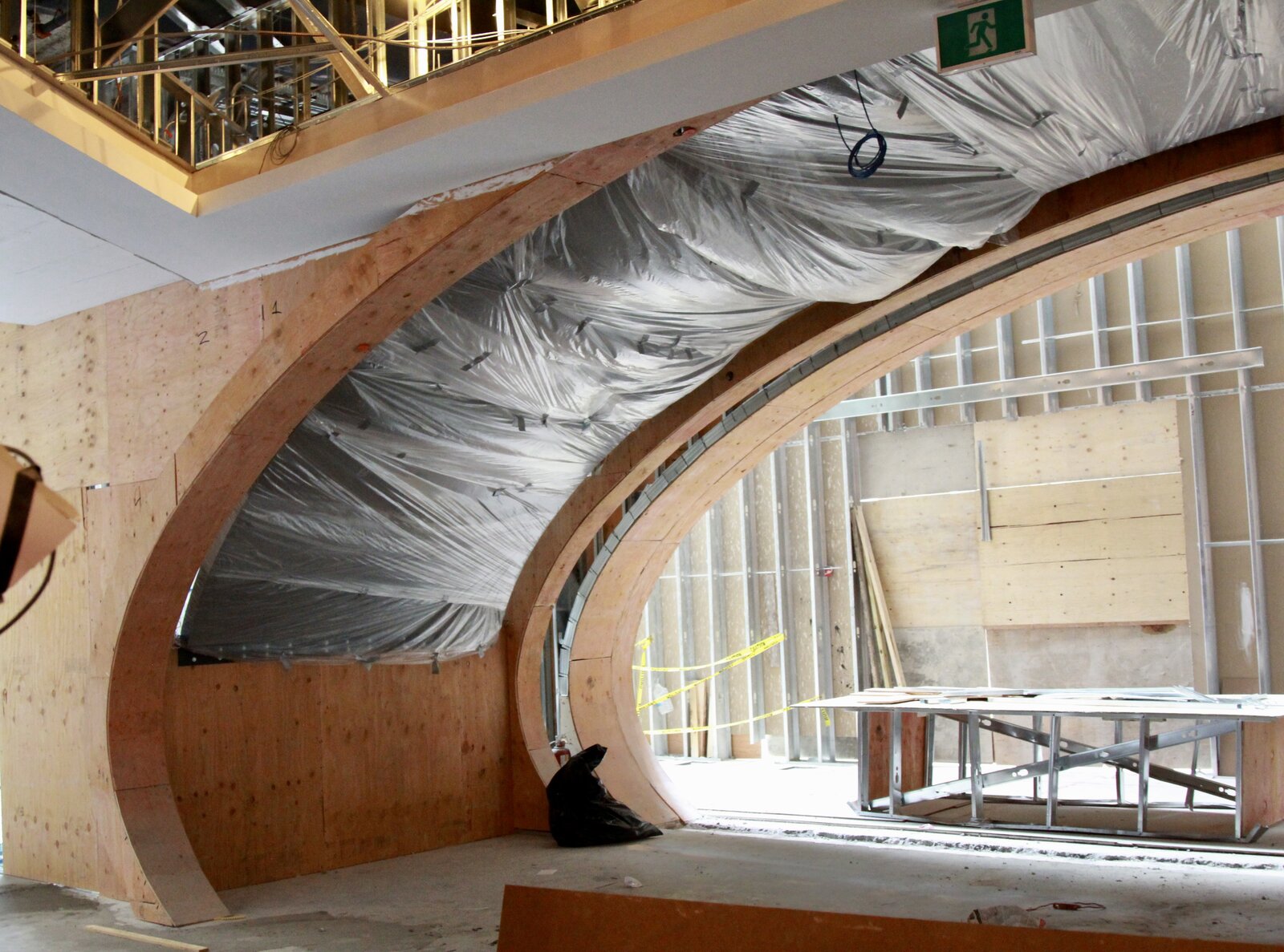 The portal frame from the other side, scaffolding above and the screen channel cut into the curve